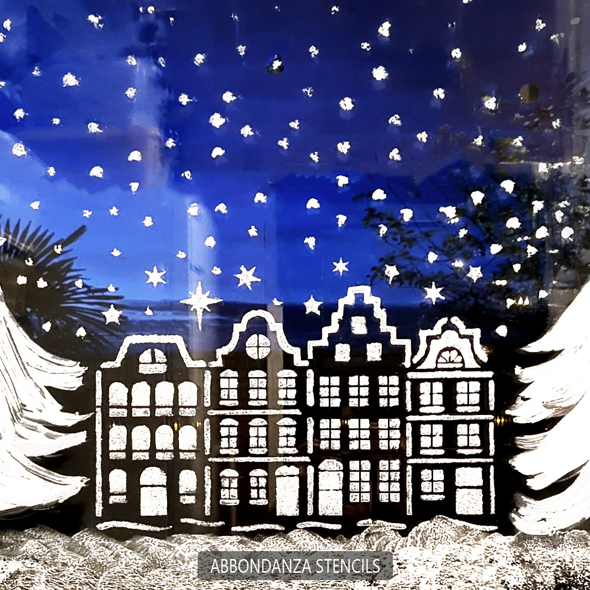 Kersthuisjes gesjabloneerd op raam