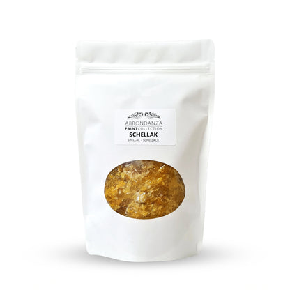 Abbondanza schellak voor gronden van bloedend hout en sealen van vlekken en noesten